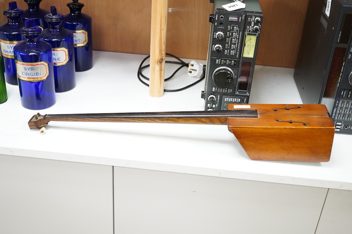 A Mongolian two stringed Morin Khuur musical instrument, 71cm overall